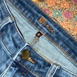 Women's Distressed Blue Jeans